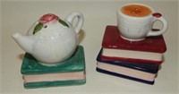 Coffee or Teapot & Cup on Books
