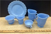 Blue Pyrex Dishes. One pitcher has a chip.