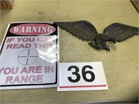 Metal eagle and sign