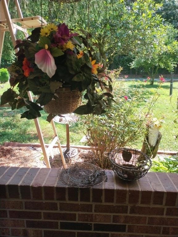 Hanging baskets with flower and basket decor