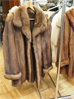 Two vintage furs including a light brown