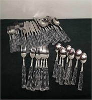 Nearly full set of silverware -1 large Fork