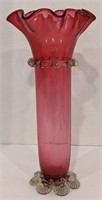 Cranberry glass ripple vase. Measures 12" tall