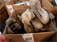 Box of older roller skates
