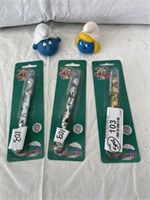 3 Looney Tunes Pens and 2 Smurf Finger Puppets
