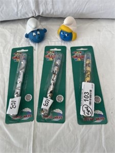 3 Looney Tunes Pens and 2 Smurf Finger Puppets