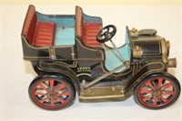 Vintage lever action tin toy car