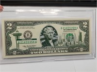 .OF)  Washington $2 note