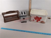 Paper cutter, toaster, bread box