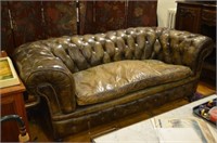 Green vintage tufted leather settee