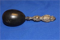 A Sterling Handle Wooden Sock Darner