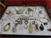 Assorted jewelry in showcase.