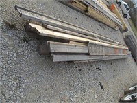 Approximately 25 pieces of 2X6 and 2X4 floor joist