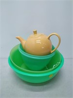 plastic bowls and tea pot