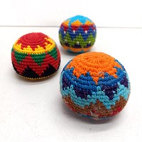 Three hackey sacks / juggling balls