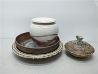 lot of pottery pieces- bowls, pot and lid, etc.