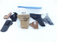 Seven assorted pistol holsters