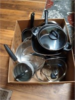 Large box of pots and pans of all sizes