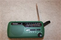 Wind up radio and phone charger