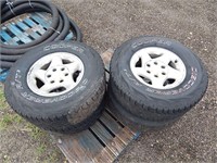 4 Tires and rims off a Toyota; size: 265/75R16