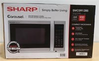 Sharp 0.9 cu. ft. 900w Sharp Stainless Steel Caro)