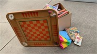 Carom board, toy box filled with toys/books/etc,