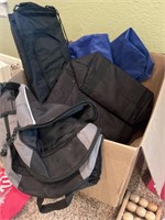 Box full of bags and backpacks