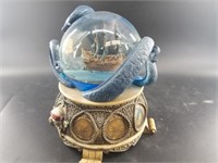 "Pirates of the Caribbean" snow globe showing the