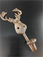Cast iron wall mounted coat hook with a stag's hea