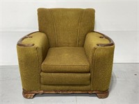 Art Deco green armchair w/ carved wood detail