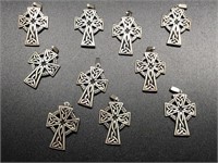 Ten Sterling Silver Crosses