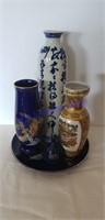 3 oriental  vases, 1 plate & a bell