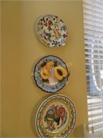 Five Collector Plates on Kitchen Wall