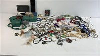 Empty jewelry boxes, necklaces, earrings,