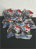 Eight Bakugan mystery figures with collector's