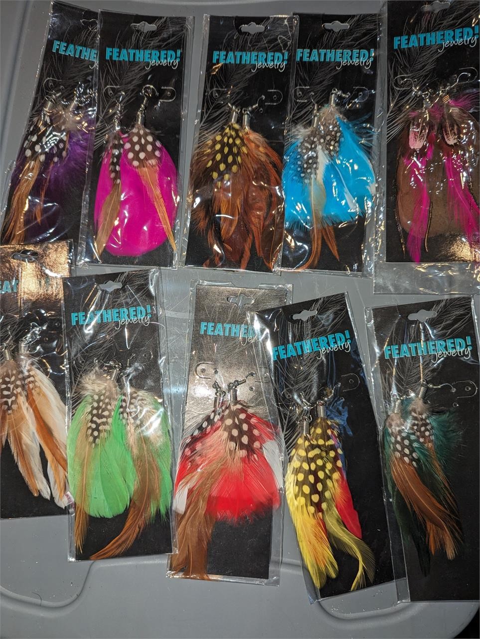 7 dozen packaged feathered earring sets for Resale
