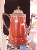 A brown enameled coffeepot, 10 1/2" marked