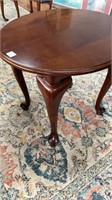 Queen Anne style end table, dark cherry finish,