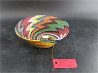 Hand woven African basket made from multiple color