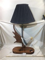 Lamp with painted eagle carved from antler