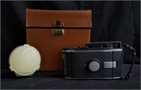 Box of vintage camera with essentials