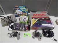 Atari and PlayStation consols, controllers, hand h