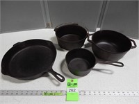 Cast iron pots and a skillet