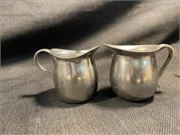 Pair Of Don Edward & Co Stainless Steel Creamer