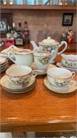 Vintage handpainted miniature children’s tea set,