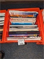 Music themed books in dairy crate