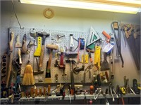 MISC TOOLS ON WALL-HAND SAW, SCREW DRIVERS, HAMMER