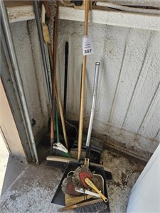 Various Brooms and Dust Pans