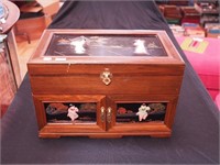 Wooden musical jewelry box with applied Asian