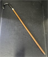 (AE) Wooden Cane With Black Handle. 36 x 5 in.